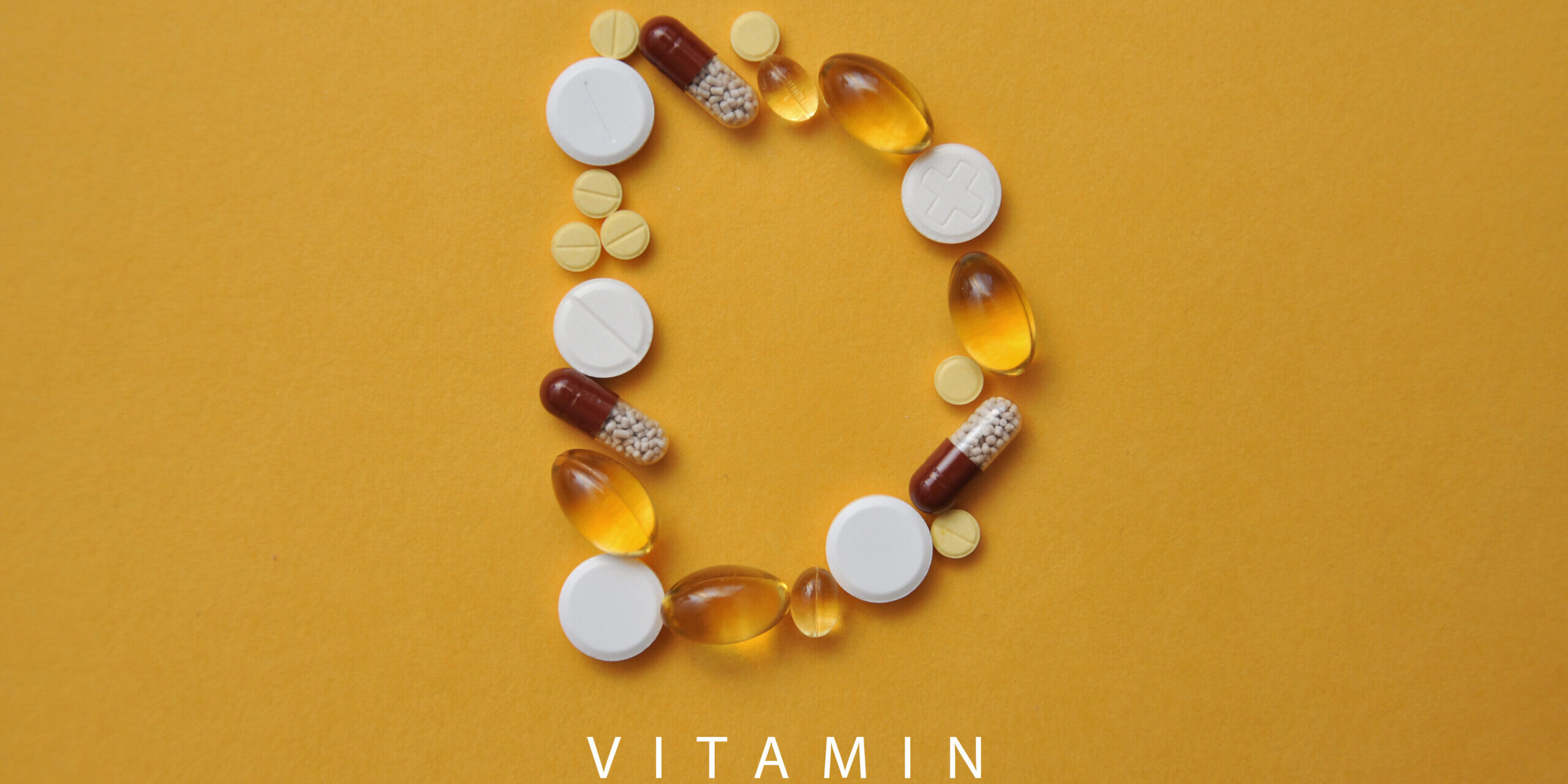 The letter D from tablets. Vitamin D